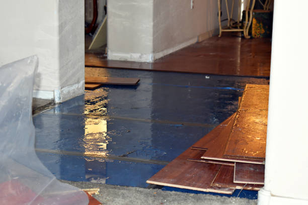 Professional Flood Damage Restoration technician working in Derry, NH